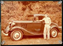 William Hyde with his first car, a 1933 Chevrolet which he owned from 1940-1952.